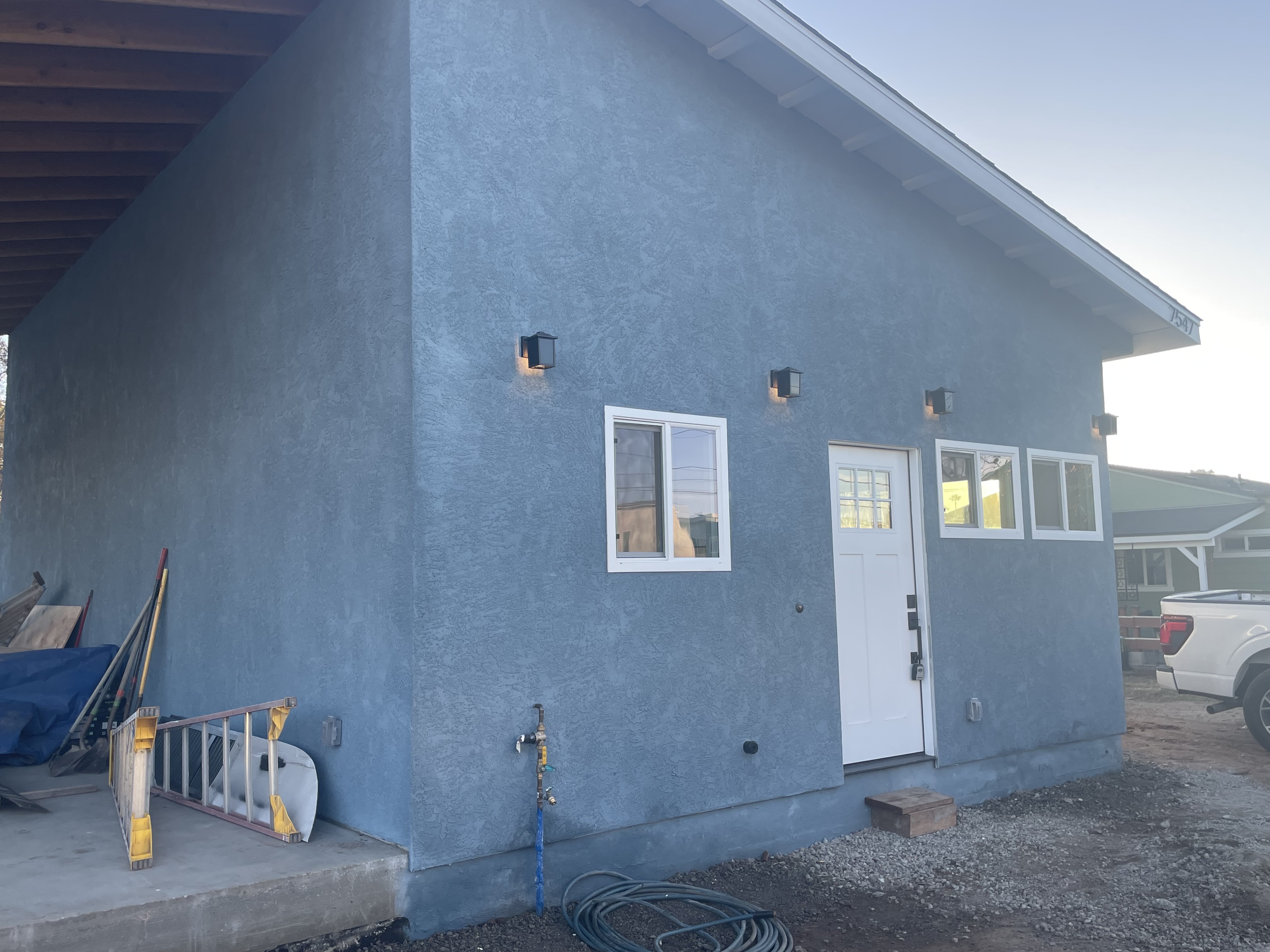 Custom stucco home exterior completed by Arrow Construction in Chula Vista